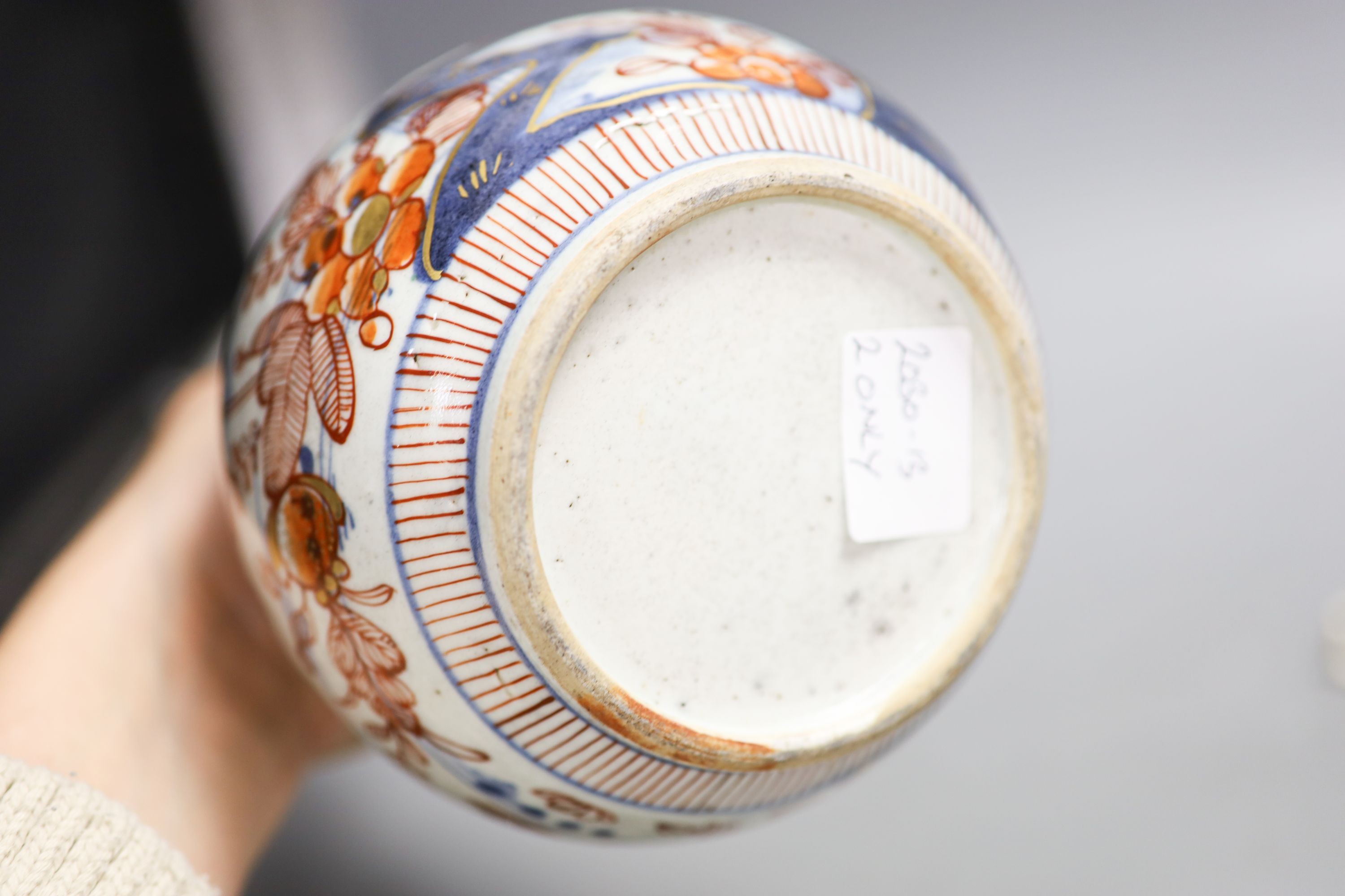 A Chinese clobbered blue and white bottle and a similar canted rectangular dish, 18th/19th century